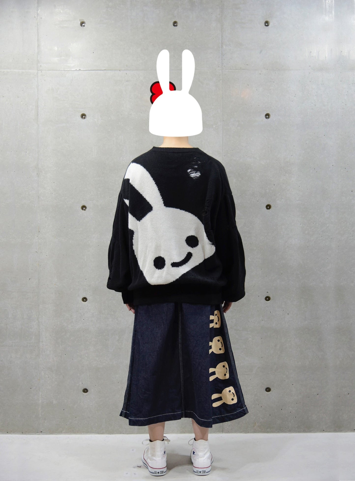 ボロボロ風のクルーネックセーター